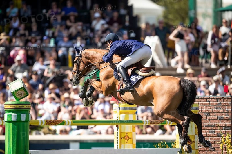 Daniel Deusser of Germany and riding Killer Queen VDM compete in the first round of the 1.60m CPKC International during the Spruce Meadows Masters, presented by Rolex, in Calgary, Alberta, Canada, North America