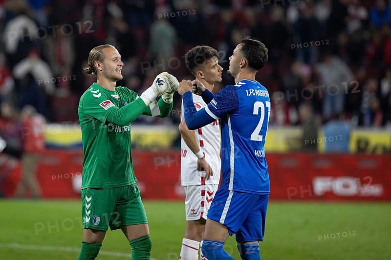 Dominik Reinmann (1. FC Magdeburg, Goalkeeper, #1), Philipp Hercher (1. FC Magdeburg, Defence, #27), 2nd Bundesliga, 1.FC Köln, 1. FC Magdeburg on 14/09/2024 at the RheinEnergieStadion in Cologne Germany . (DFL/DFB REGULATIONS PROHIBIT ANY USE OF PHOTOGRAPHS AS IMAGE SEQUENCES AND/OR QUASI-VIDEO)