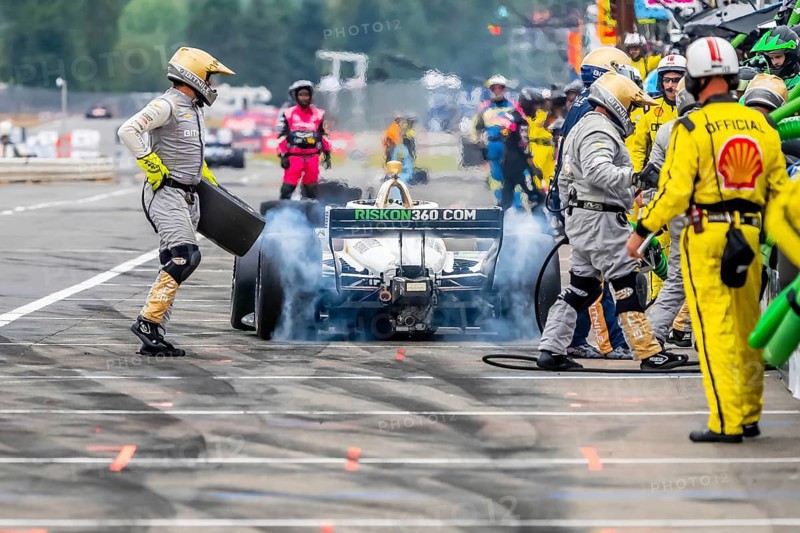 INDYCAR Series driver, RINUS VEEKAY (21) of Hoofddorp, Netherlands, brings his car in for service during the Bitnile.com Grand Prix of Portland at Portland International Raceway in Portland OR