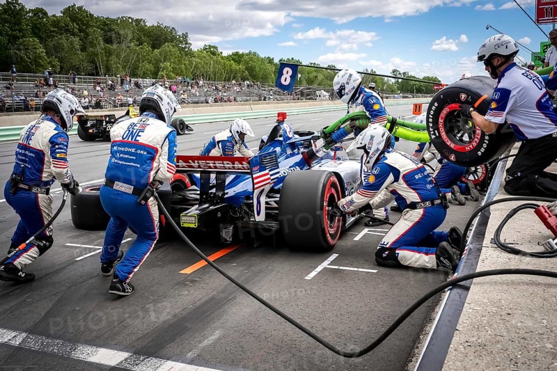 LINUS LUNDQVIST (R) (8) of Stockholm, Sweden comes down pit road for service during the XPEL Grand Prix at Road America in Elkhart Lake, WI