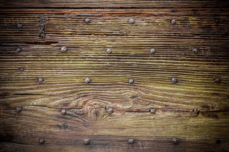 Old wooden boards, with moss and rusty nails