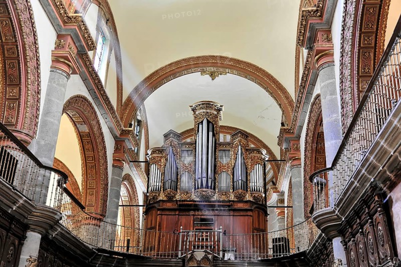 Oaxaca, Mexico, Central America, Baroque organ in a church with richly decorated pipes and wooden case