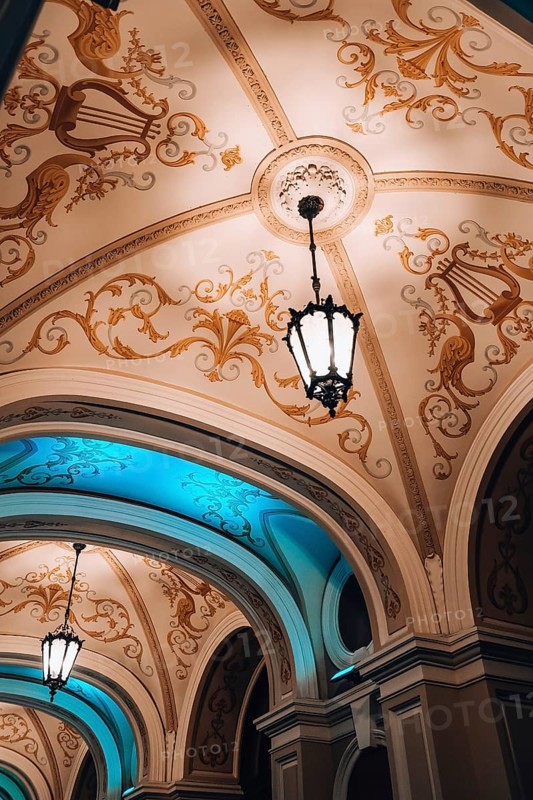 Low angle view of chandelier National Odessa National Academic Opera and Ballet Theatre at night. Architectural monument. Travel destination. Vacation Concept. Exterior Art building