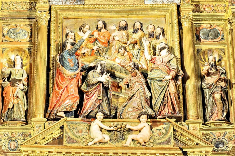 Detail of a baroque relief with religious figures and golden decorations, Iglesia de Santa Maria de la Asuncion, Arcos de la Frontera, Province of Cadiz, Andalusia, Spain