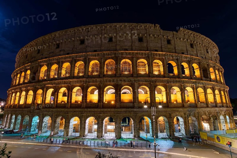 Colosseum at night, an oval amphitheatre and the most popular tourist attraction in Rome, Italy