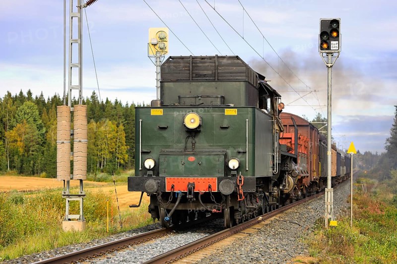 Hr1 class steam locomotive Ukko-Pekka 1009 pulling carriages between Urjala and Humppila, Finland. September 18, 2020
