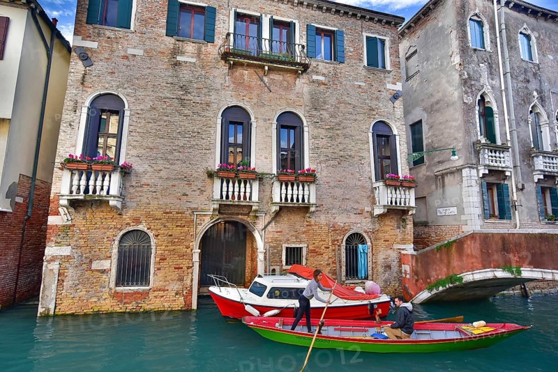 Vintage buildings along the canal in Venice, Italy