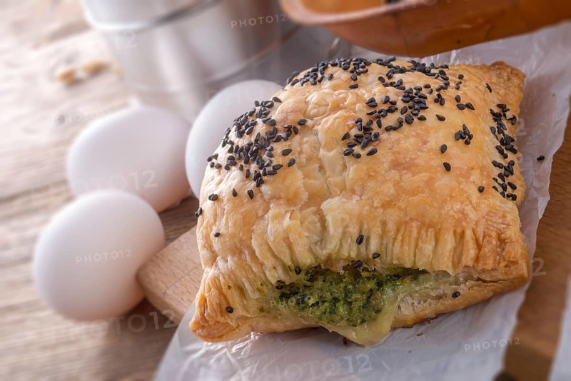 Puff pastry with spinach filling and black cumin