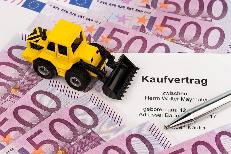The purchase contract for a new excavator. With euro money and biros Austria