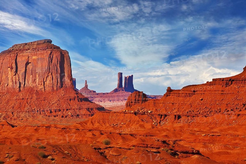 Magic view of the red desert. Monument Valley in the Navajo Indian Reservation. Arizona, USA. The unique red sandstone buttes mitts