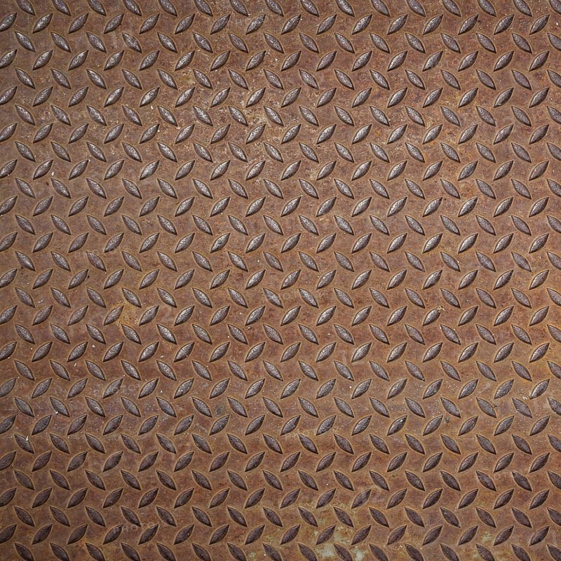 Front view of a rusty panel with non-slip surface