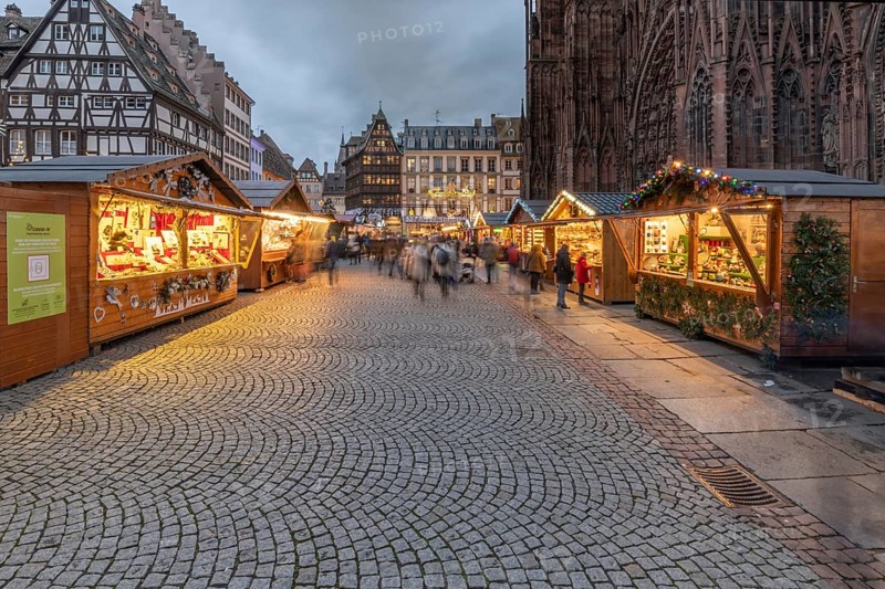 Famous Christmas market on the cathedral square in Strasbourg in Alsace. Health precautions and mandatory barrier gestures, protections against the covid pandemic in 2021