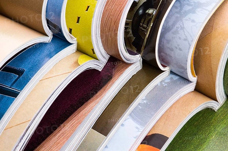 Stack of open magazines