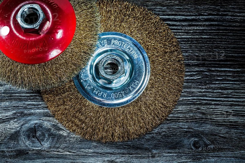 Wire wheel brushes on vintage wooden board