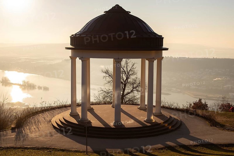 Beautiful temple in a landscape shot. Sunrise on a winter morning. Beautiful view along the Rhine at the Niederwaldtempel, Niederwalddenkmal, Hesse, Germany