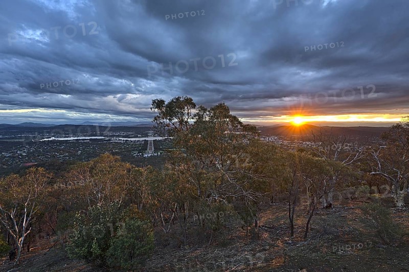 Canberra at night from Mount Ainslie Lookout and with the setting sun
