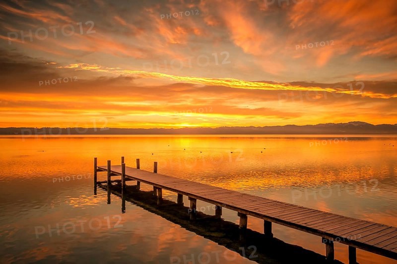 An image of a sunrise at the Starnberg Lake in Germany