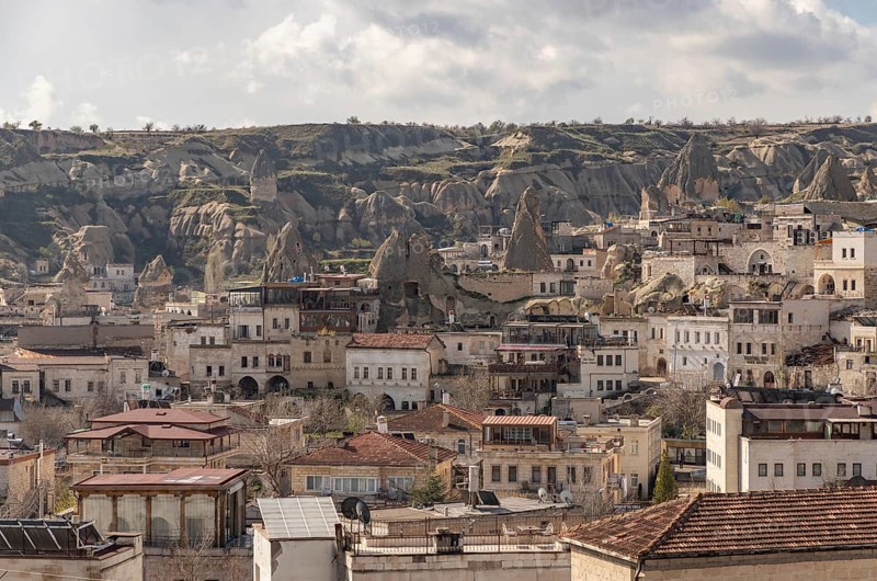 A picture of the town of Goreme and the landscape of the Goreme Historical National Park, in Cappadocia