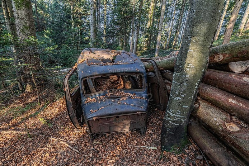 Wrecked carHudson Terraplane K Tourer Sedan built in 1935 that has been sitting in a forest for decades, Menzingen, Zug, Switzerland