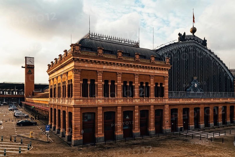 Madrid, Spain, October 27, 2018: Exterior view of old Atocha Railway Station at sunrise