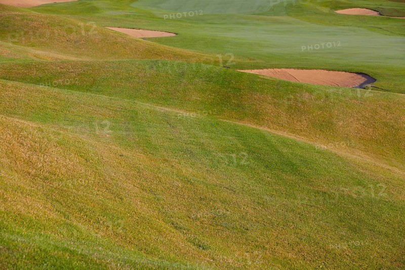 Summer golf course with different bunkers