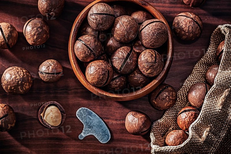 Macadamia Nuts On Vintage Wood Close up