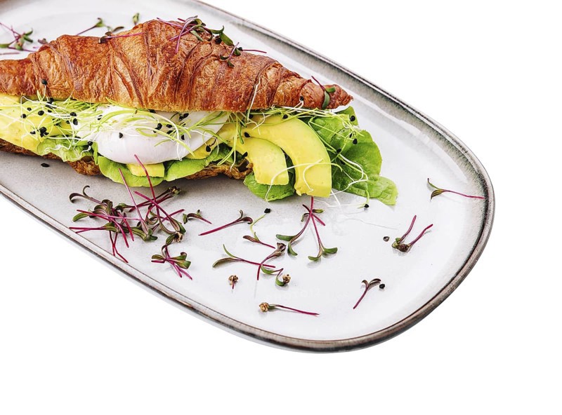 food still-life, Croissant benedict salmon with poched egg, served with fresh salad
