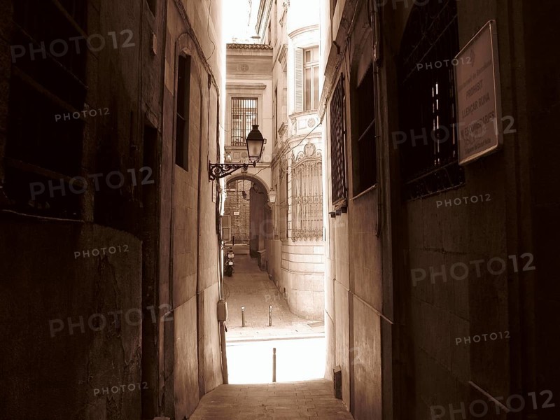 Narrow street in the city center of Barcelona, Barcelona, Spain