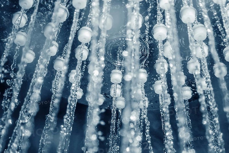 Shower head with running water closeup