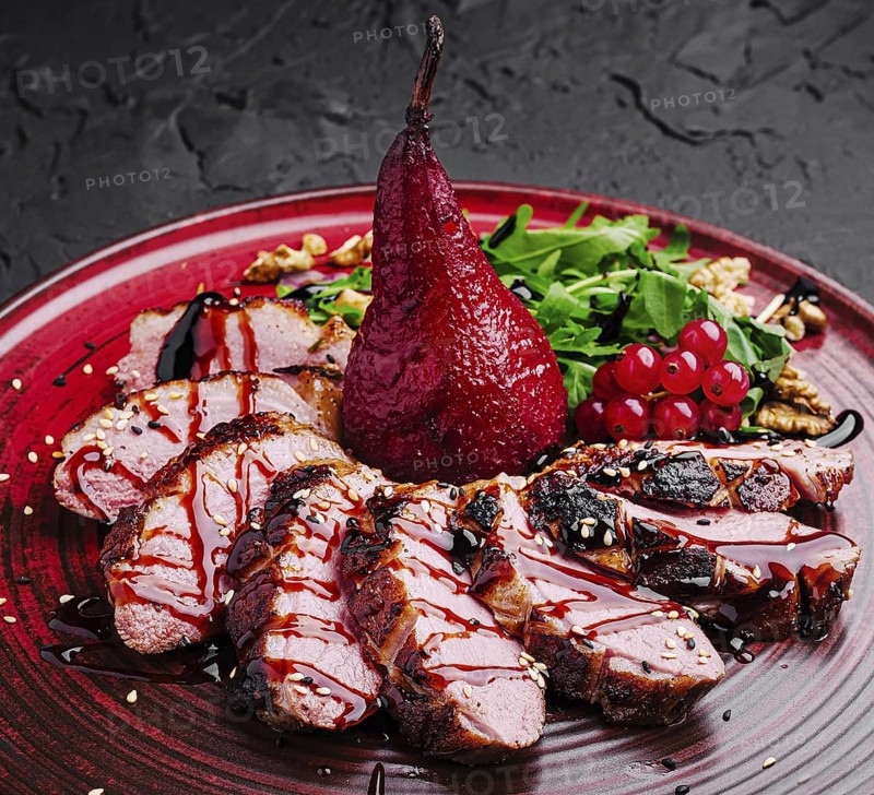 Food, A beautifully plated gourmet dish showcases succulent slices of duck, drizzled with sauce, accompanied by a poached pear, fresh greens, and vibrant berries