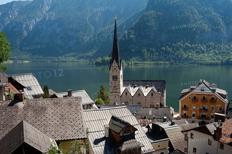 18 Jun 2019, Hallstatt, Salzkammergut, Upper Austria, Austria, Europe, View of Hallstatt with Lake Hallstatt and mountains in the background. The small town is a favourite travel destination for the Chinese and exists as a replica in the province of Guangdong in China