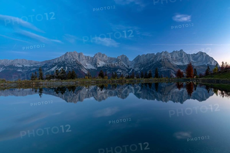 Wilder Kaiser reflected in the Astbergsee in the early morning, Going, Tyrol, Austria