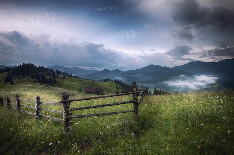 Mountains rural landscape before rain. Carpathian mountains, Ukraine