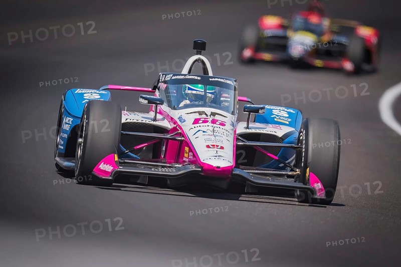 TOM BLOMQVIST (R) (66) of Cambridge, England practices for the 108th Running of the Indianapolis 500 at the Indianapolis Motor Speedway in Speedway, IN