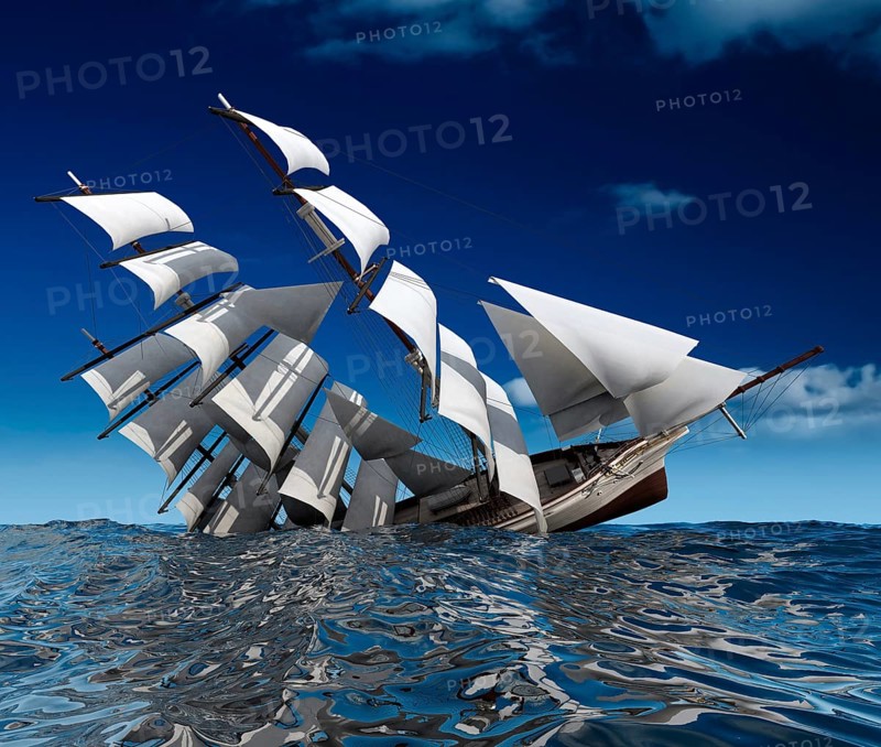 Beautiful sailing ship sinks in the open ocean