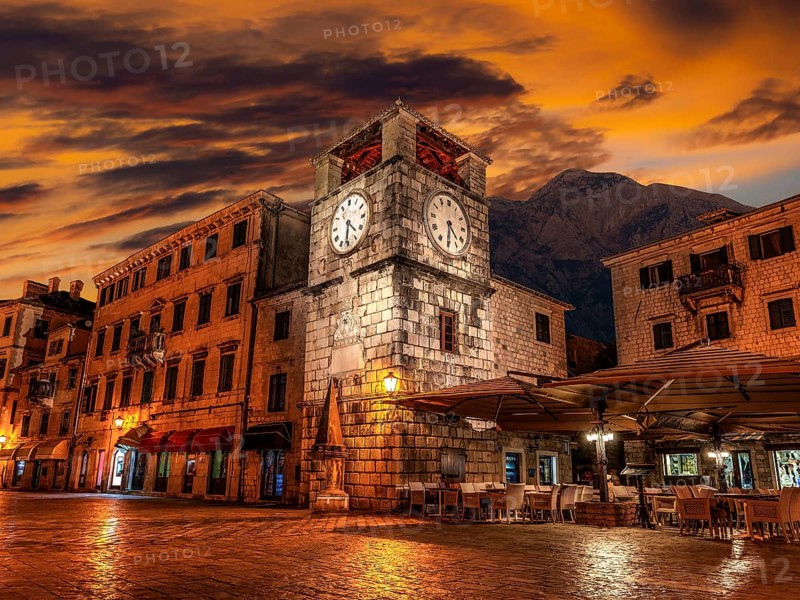 Clock tower on central square of Old Town in Kotor in early morning, Montenegro
