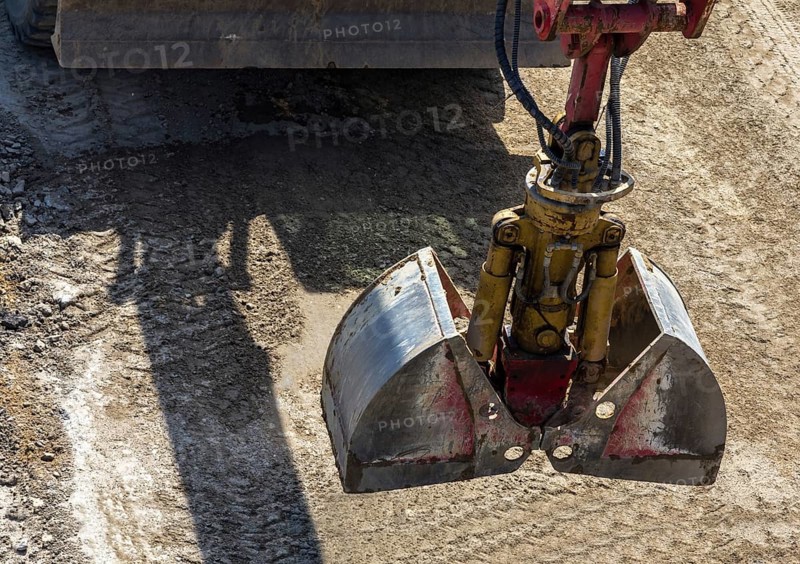 Excavator grab on the construction site