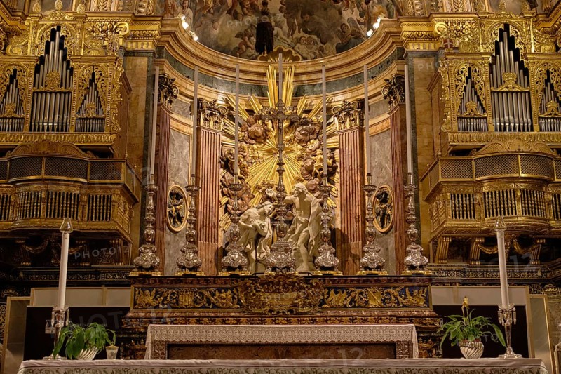 The ornate Baroque main altar and organ of St. John Co-Cathedral, Valletta, Malta