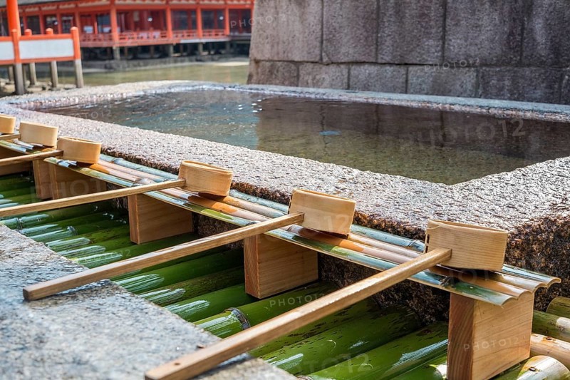 Chozuya with bamboo spoons for ritual purification in the temple