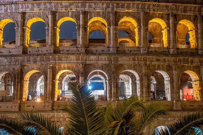 The Colosseum, famous and unique historical building of the Eternal City. View in the morning with great lighting, light installation. no people, Rome, Italy