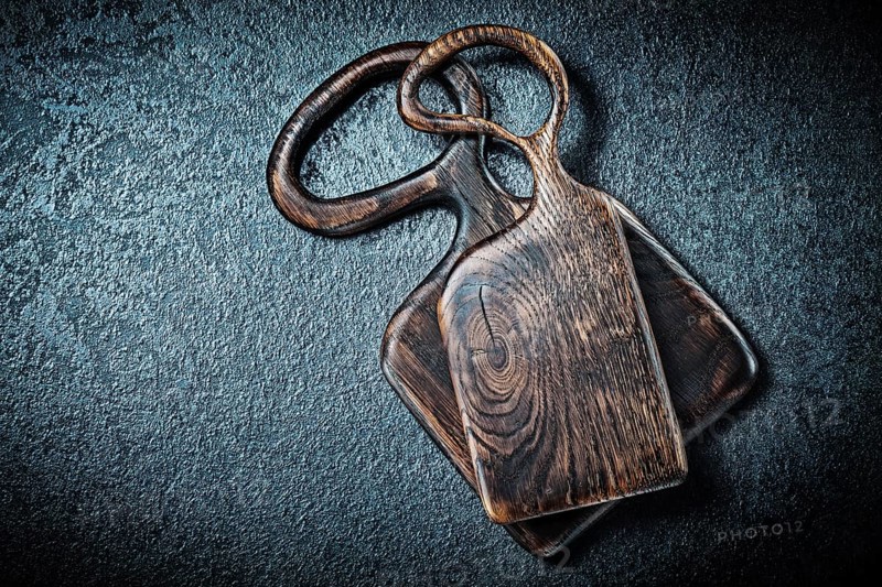 Two vintage wood cutting boards close up