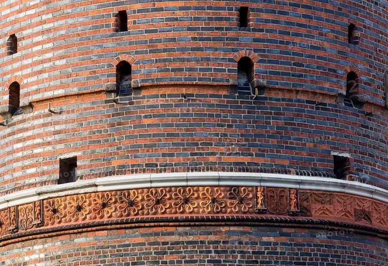 Field side with terracotta decoration