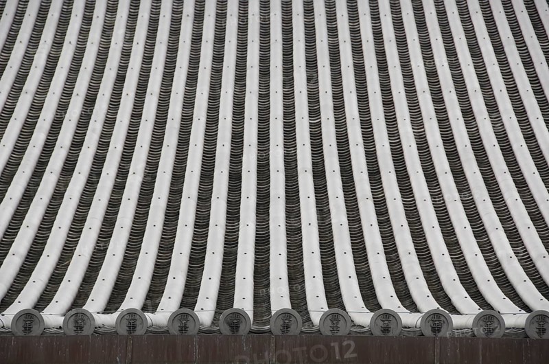 Detail of a japanese roof with traditional roofing tiles, Kyoto, Japan