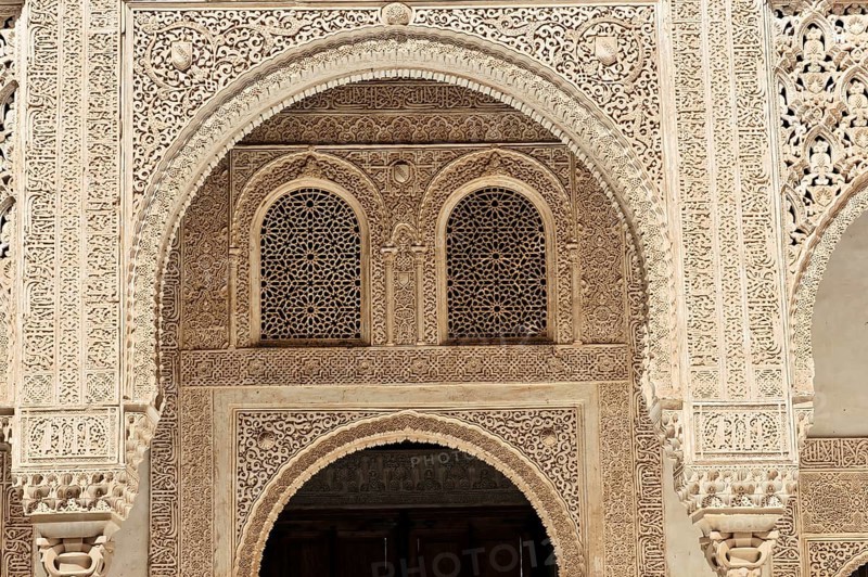 Alhambra, Granada, Andalusia, Spain, Fine arabesques and intricate architectural details in stone carving, richly decorated, Alhambra, Granada, Andalusia, Spain