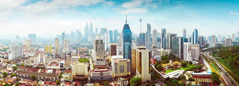 Panorama cityscape view in the middle of Kuala Lumpur city center, early morning with little mist, Malaysia