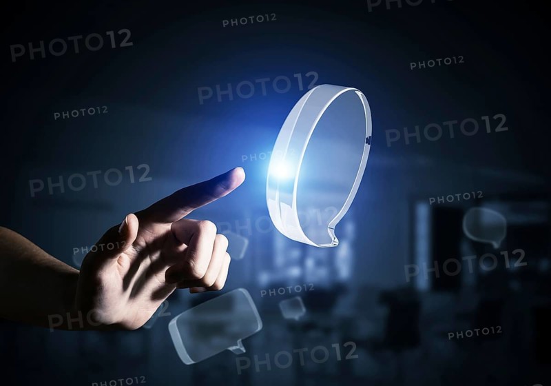Concept of communication by glass empty chat icon on gray background. Mixed media