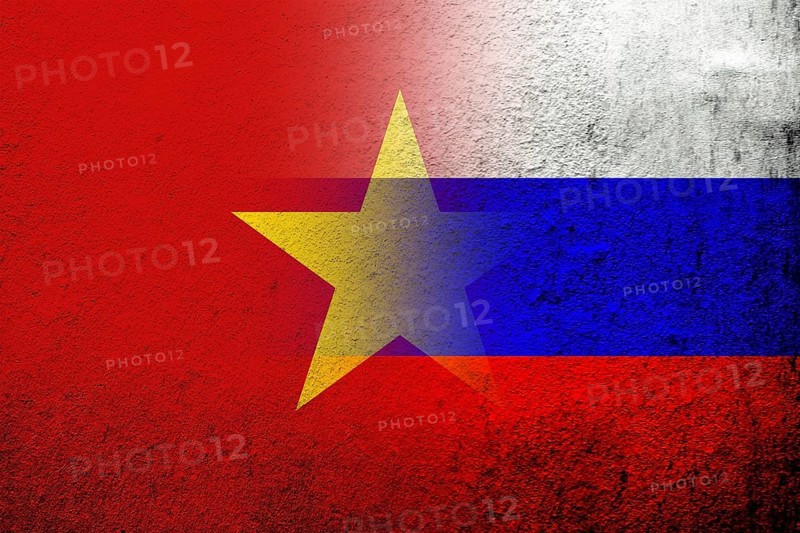 National flag of Russian Federation with The Socialist Republic of Vietnam National flag. Grunge background