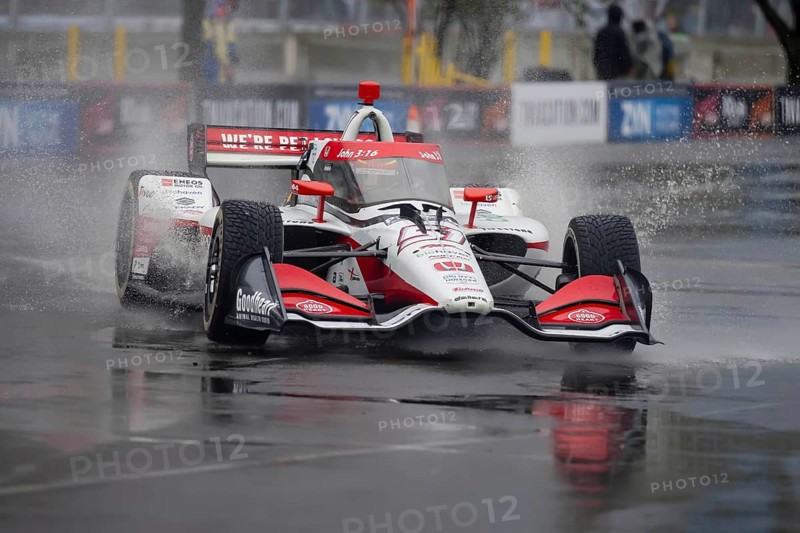INDYCAR Series driver, STING RAY ROBB (R) (51) of Payette, Idaho, travels through the turns during a wet and dangerous practice session for the Big Machine Music City Grand Prix at Streets of Nashville in Nashville TN