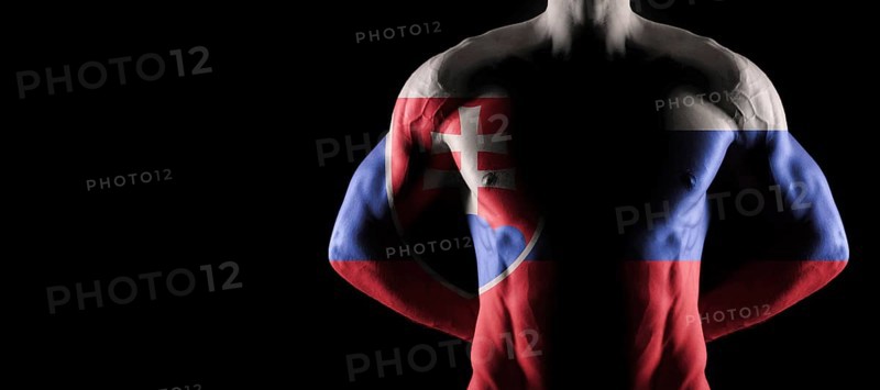 Slovakia flag on muscled male torso with abs, black background