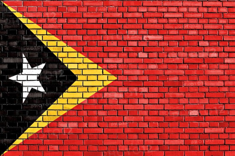 Flag of East Timor painted on brick wall